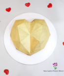 Golden heart pinata cake