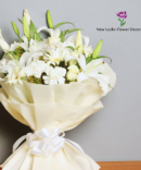 white lily gerbera flower bouquet