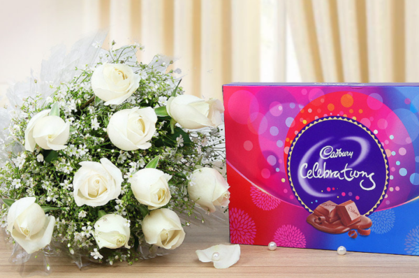 white rose flowers with chocolate
