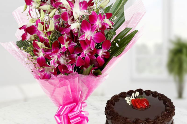 Orchids bouquet and chocolate cake