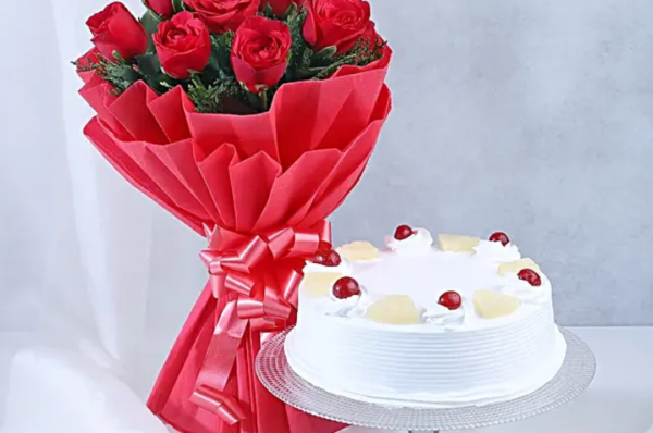 red rose bouquet with cake