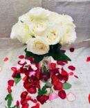 White Roses in Glass Vase