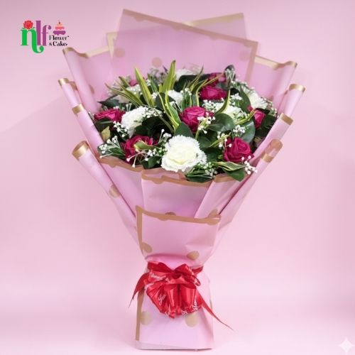 Vibrant Magenta Roses & White Carnations Bouquet